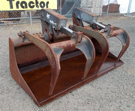 used grapple bucket skid steer